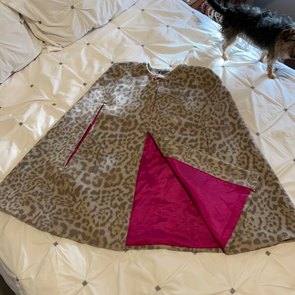 Beautiful cape with hot pink lining